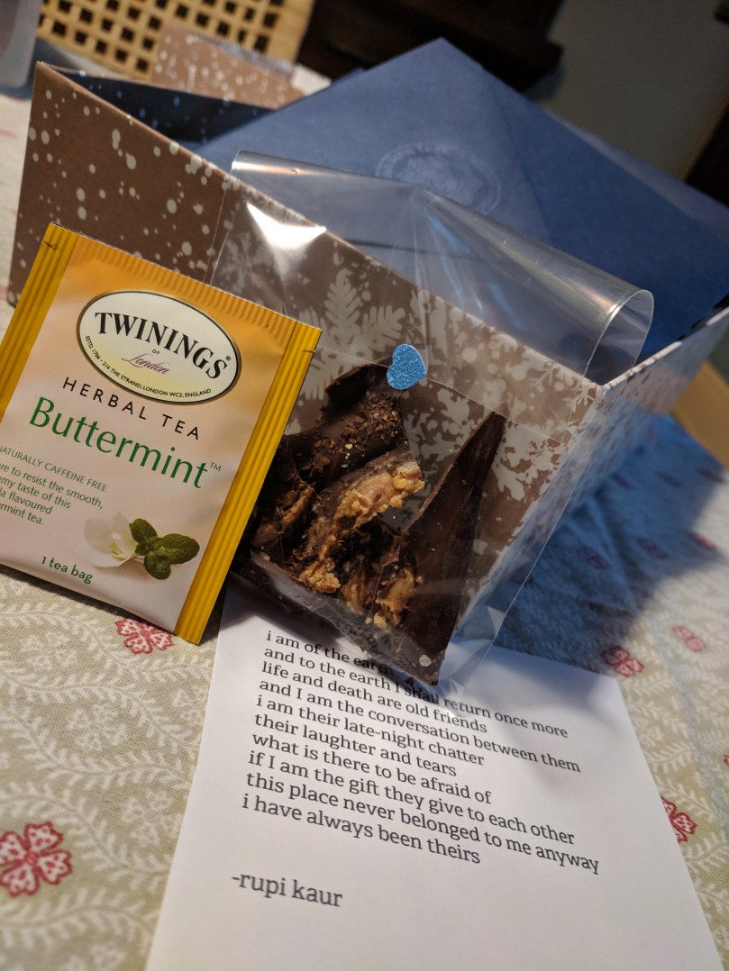 Buttermint tea packet, spicy chocolate bark and rupi kaur poem